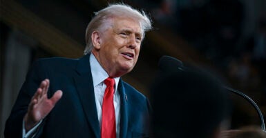 WASHINGTON, DC - FEBRUARY 24: U.S. President Donald Trump delivers the State of the Union address during a joint session of Congress in the House Chamber at the Capitol on February 24, 2026 in Washington, DC. Trump delivered his address days after the Supreme Court struck down the administration's tariff strategy, and amid a U.S. military buildup in the Persian Gulf threatening Iran. (Photo by Kenny Holston-Pool/Getty Images)