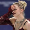Amber Glenn gets emotional after failing to complete an element competes during the women's short program figure skating at the 2026 Winter Olympics, in Milan, Italy, Tuesday, Feb. 17, 2026. (Robert Gauthier / Los Angeles Times via Getty Images)