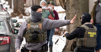 MINNEAPOLIS, MINNESOTA - FEBRUARY 05: Observers film ICE agents as they hold a perimeter after one of their vehicles got a flat tire on Penn Avenue on February 5, 2026 in Minneapolis, Minnesota. Protests continue calling for an end to immigration raids in the Twin cities which have already resulted in the fatal shooting deaths of Alex Pretti, a VA nurse, and Renee Good, a mother of three, by federal agents. (Photo by Stephen Maturen/Getty Images)