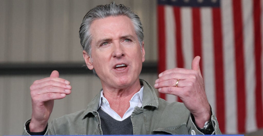 California Governor Gavin Newsom speaks about the California National Guard and California Highway Patrol (CHP) seizures of illicit drugs including fentanyl and border security operations during a press conference at Montgomery-Gibbs Executive Airport in San Diego, California on February 2, 2026. (Photo by Patrick T. Fallon / AFP via Getty Images)