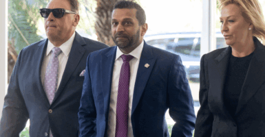 FBI Director Kash Patel (C) arrives to attend the wedding of Dan Scavino, White House Deputy Chief of Staff, and Erin Elmore, the Department of State Director of Art in Embassies, at Mar-a-Lago in Palm Beach, Florida, February 1, 2026. (Photo by SAUL LOEB / AFP via Getty Images)