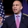 House Minority Leader Hakeem Jeffries speaks to reporters in the Capitol.