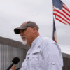 Chip Roy speaks to a a reporter following a news conference to commemorate state-sponsored border wall construction.