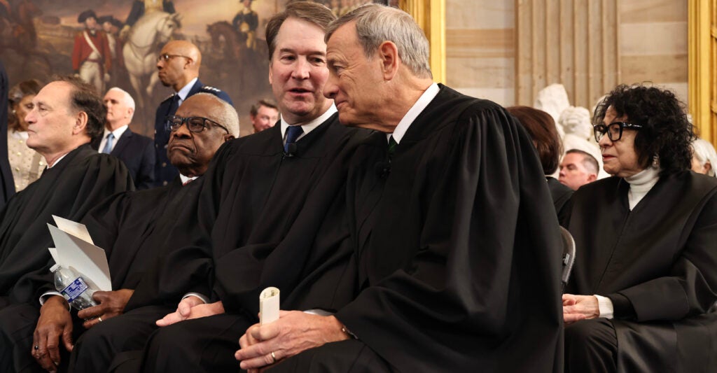 WASHINGTON, DC - JANUARY 20: U.S. Supreme Court Associate Justice Brett Kavanaugh and U.S. Supreme Court Chief Justice John Roberts speak during inauguration ceremonies in the Rotunda of the U.S. Capitol on January 20, 2025 in Washington, DC. Donald Trump takes office for his second term as the 47th president of the United States. (Photo by Chip Somodevilla/Getty Images)