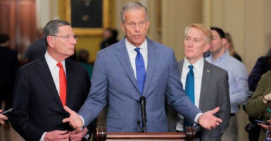 Senate Majority Leader John Thune (R-SD) speaks with reporters alongside Sen. John Barrasso (R-WY) (L) and Sen. James Lankford (R-OK) after Senate luncheons on February 25, 2026
