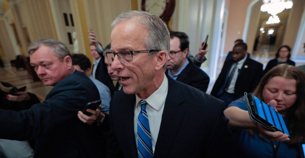 Senate Majority Leader John Thune (R-SD) is surrounded by reporters as he walks from his office to the Senate Chamber at the U.S. Capitol on February 09, 2026
