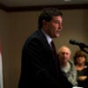 Rep. Troy Balderson speaks before a crowd at a podium.