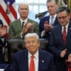 Senate Majority Whip John Barrasso (R-WY), U.S. President Donald Trump and Speaker of the House Mike Johnson (R-LA) attend a bill signing in the Oval Office of the White House on February 03, 2026