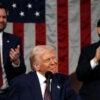 Vice President JD Vance and Speaker of the House Mike Johnson (R-LA) applaud as US President Donald Trump looks to the guests during his address to a joint session of Congress at the US Capitol in Washington, DC, on March 4, 2025.