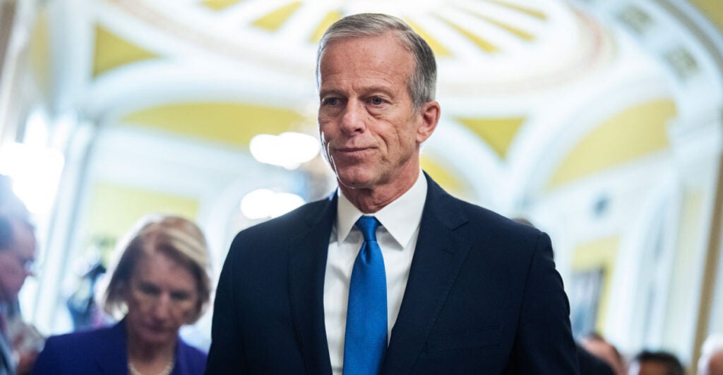 Senate Majority Leader John Thune walks through the United States Capitol.