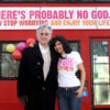 Professor Richard Dawkins (right) with Guardian journalist Ariane Sherine beside a bus displaying an atheist message in Kensington Gardens, London. (Photo by Anthony Devlin - PA Images/PA Images via Getty Images)