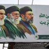 A billboard featuring portraits of Ayatollah Ali Khomeini, Ayatollah Khamenei and Ayatollah Mojtaba Khamenei