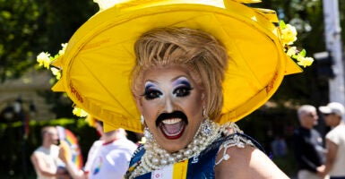 MELBOURNE, AUSTRALIA - 2026/02/01: A drag queen dressed as a parcel, marching as part of the AusPost contingent. Midsumma is a month-long pride festival which occurs annually. Held each summer, the festival spans weeks of performance, visual art, community events and public celebration across the city culminating in the march through St Kilda. (Photo by Josh Stanyer/SOPA Images/LightRocket via Getty Images)