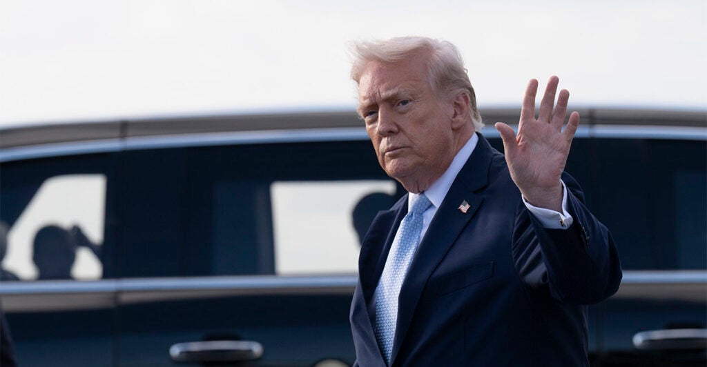 PALM BEACH, FLORIDA - MARCH 20: U.S. President Donald Trump waves after landing at Palm Beach International Airport on March 20, 2026 in Palm Beach, Florida. President Trump is scheduled to spend the weekend at his South Florida estate of Mar-a-Lago in West Palm Beach. (Photo by Roberto Schmidt/Getty Images)