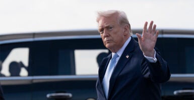 PALM BEACH, FLORIDA - MARCH 20: U.S. President Donald Trump waves after landing at Palm Beach International Airport on March 20, 2026 in Palm Beach, Florida. President Trump is scheduled to spend the weekend at his South Florida estate of Mar-a-Lago in West Palm Beach. (Photo by Roberto Schmidt/Getty Images)