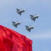 CHANGCHUN, CHINA - SEPTEMBER 19: J-20 fighter jets fly in the sky during flight performance at the aviation open-day activities of the Chinese People's Liberation Army Air Force (PLAAF) and the Changchun Air Show 2025 on September 19, 2025 in Changchun, Jilin Province of China. The event will be held from September 19 to 23 in Changchun. (Photo by VCG/VCG via Getty Images)