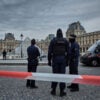 French Police officers in front of the Louvre Museum after a Jewlery Heist.