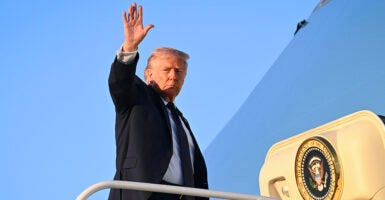 MIAMI, FLORIDA - MARCH 09: U.S. President Donald Trump boards Air Force One at Miami International Airport on March 09, 2026 in Miami, Florida. Trump was returning to Washington after meeting with House Republicans at his Doral resort to hash out the party's economic and foreign policy message ahead of the midterm elections. (Photo by Roberto Schmidt/Getty Images)