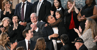 Marcus Coleman holds his daughter Dalilah Coleman.