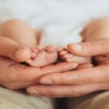 Father with a newborn baby beautiful photos of a young adult man holding little son, paternity leave - stock photo. With love of photography (Getty Images)