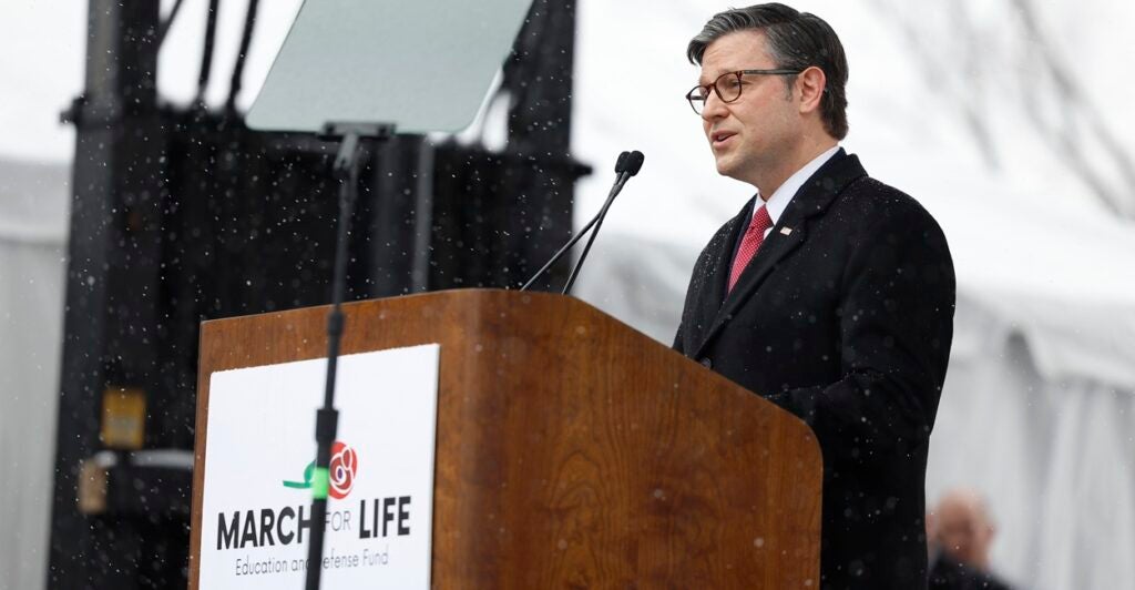 Mike Johnson speaks at a podium that says "March for Life."