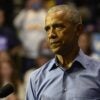 Former President Barack Obama in front of a crowd.