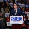 Pennsylvania Gov. Josh Shapiro speaking to supporters from a podium.