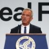 Robert F. Kennedy Jr. speaking at a podium.