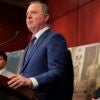 Sen. Adam Schiff at a podium.
