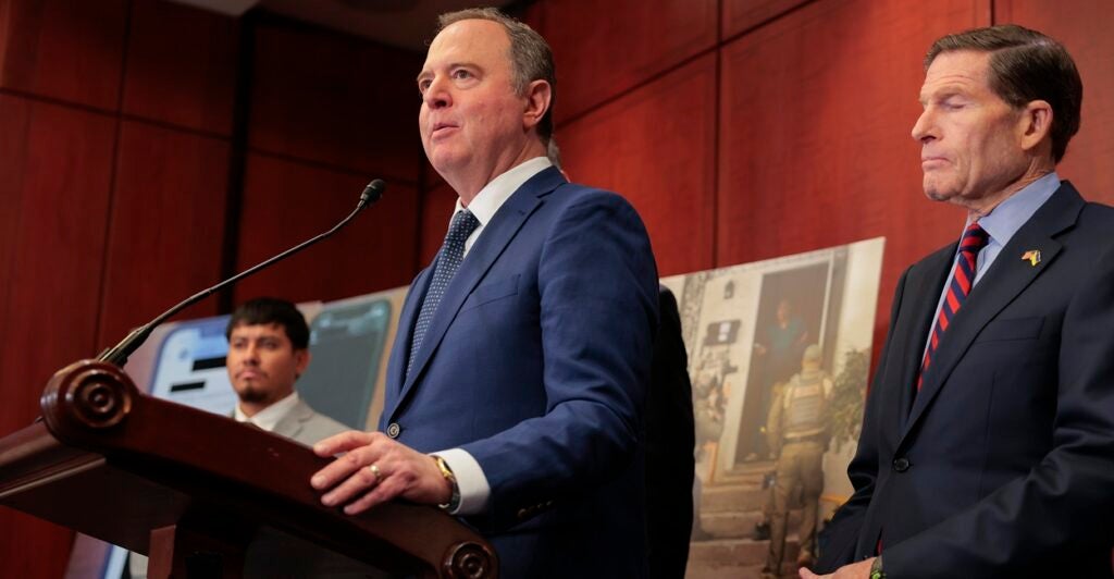 Sen. Adam Schiff at a podium.