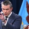 Secretary of War Pete Hegseth pointing