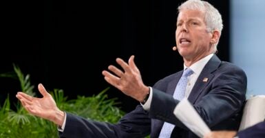 Secretary of Energy Chris Wright speaking while seated