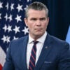 Hegseth speaks to reporters at a press conference.
