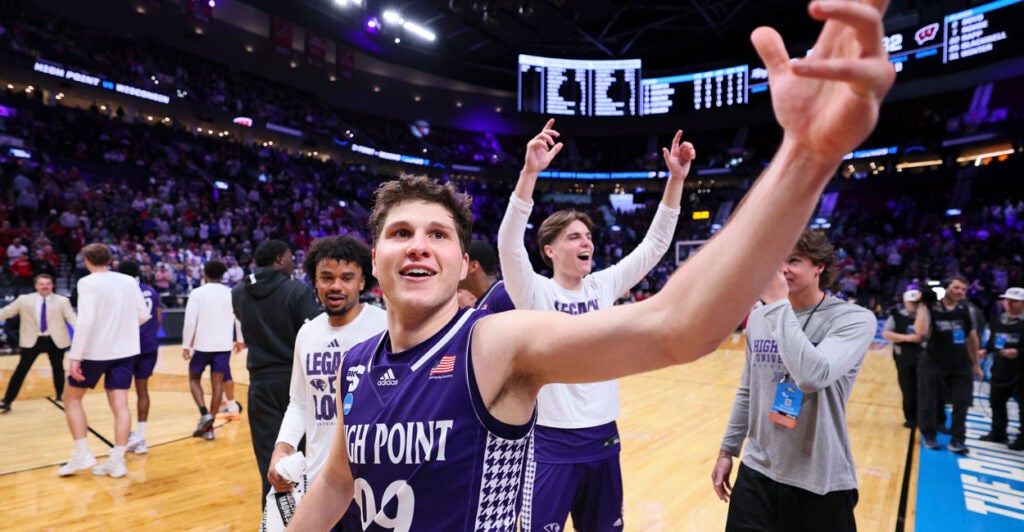 Guard Chase Johnston #99 of the High Point Panthers waves to the crowd after the High Point Panthers upset the Wisconsin Badgers in the first round of the 2026 NCAA Men's Basketball Tournament on March 19, 2026.