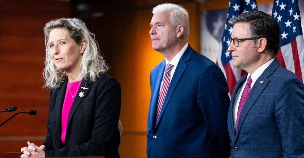 Rep. Jen Kiggans, R-Va., speaks as House Majority Whip Tom Emmer, R-Minn.,, and Speaker of the House Mike Johnson, R-La., listen during the House Republicans' news conference following the House Republican Conference meeting in the U.S. Capitol on Wednesday, December 10, 2025.