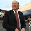 US Secretary of Commerce Howard Lutnick boards Air Force One prior to departure from Richard B. Russell Regional Airport in Rome, Georgia, February 19, 2025. Trump is returning to Washington after visiting local businesses and give remarks about the economy at a steel factory in northwest Georgia. (Photo by SAUL LOEB / AFP via Getty Images)