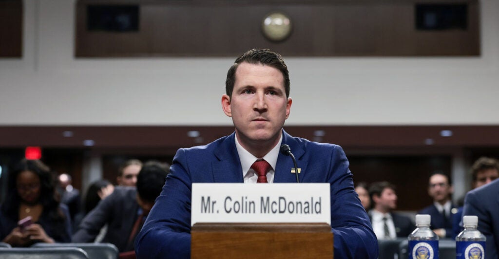 Colin McDonald listens during opening remarks at a Senate Judiciary Committee nomination hearing on Capitol Hill on February 25, 2026 in Washington, DC.