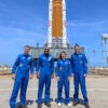 NASA astronauts Reid Wiseman, Artemis II commander, left, Victor Glover, Artemis II pilot, Christina Koch, Artemis II mission specialist, and CSA (Canadian Space Agency) astronaut Jeremy Hansen, Artemis II mission specialist, right, stop for a group photograph as they visit NASA's Artemis II SLS (Space Launch System) rocket and Orion spacecraft, on March 30, 2026 in Florida.