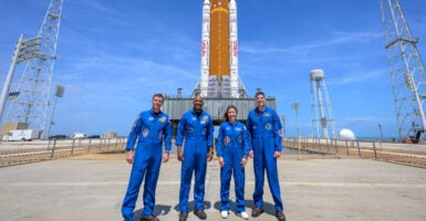 NASA astronauts Reid Wiseman, Artemis II commander, left, Victor Glover, Artemis II pilot, Christina Koch, Artemis II mission specialist, and CSA (Canadian Space Agency) astronaut Jeremy Hansen, Artemis II mission specialist, right, stop for a group photograph as they visit NASA's Artemis II SLS (Space Launch System) rocket and Orion spacecraft, on March 30, 2026 in Florida.