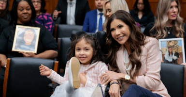 DHS Kristi Noem and 7-year-old Dalilah Coleman.