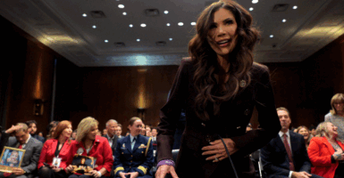 Kristi Noem arrives to testify before the Senate Judiciary Committee.
