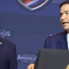 US President Donald Trump looks on as Secretary of State Marco Rubio (R) speaks during the "Shield of the Americas" Summit at Trump National Doral in Miami, Florida, March 7, 2026. (Photo by SAUL LOEB / AFP via Getty Images)