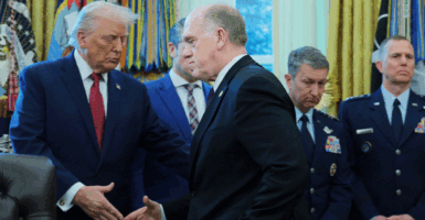WASHINGTON, DC - DECEMBER 15: U.S. President Donald Trump shakes hands with White House Border Czar Tom Homan during a ceremony for the presentation of the Mexican Border Defense Medal in the Oval Office of the White House on December 15, 2025 in Washington, DC. During the ceremony, Trump recognized the first 13 service members to receive the recently established Mexican Border Defense Medal (MBDM), which recognizes service members supporting Customs and Border Protection on the U.S.-Mexico border. (Photo by Anna Moneymaker/Getty Images)