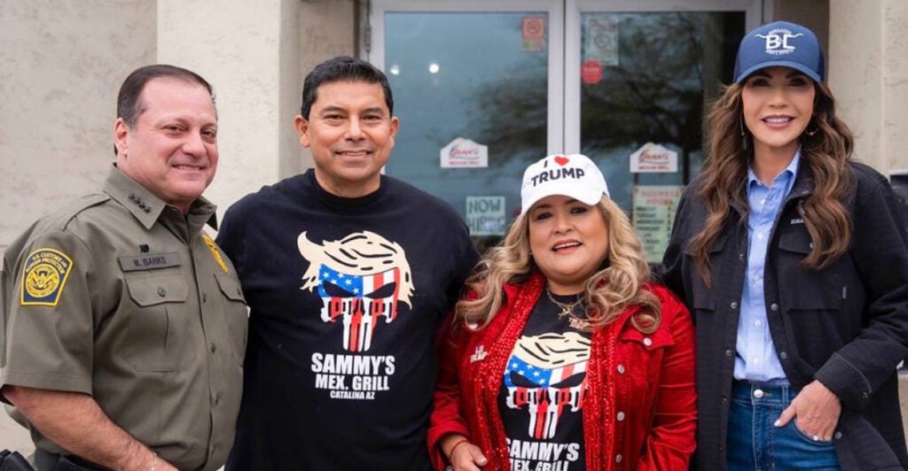 U.S. Border Patrol Chief Michael Banks, Jorge Rivas, Betty Rivas, and Secretary of Homeland Security Kristi Noem stand outside Sammy's Mexican Grill.