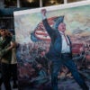 Voters unveil painting of Trump in New York City.