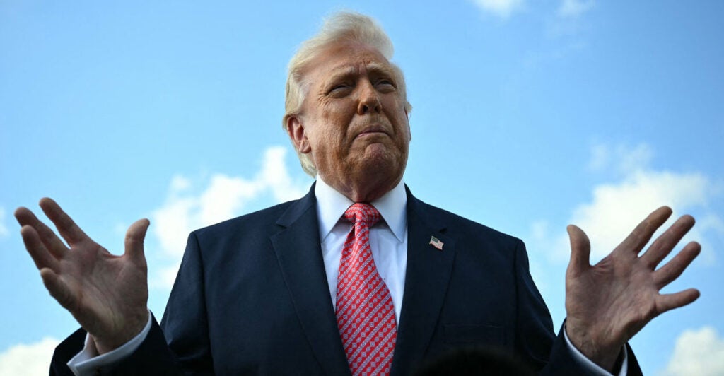 President Donald Trump speaks to reporters.