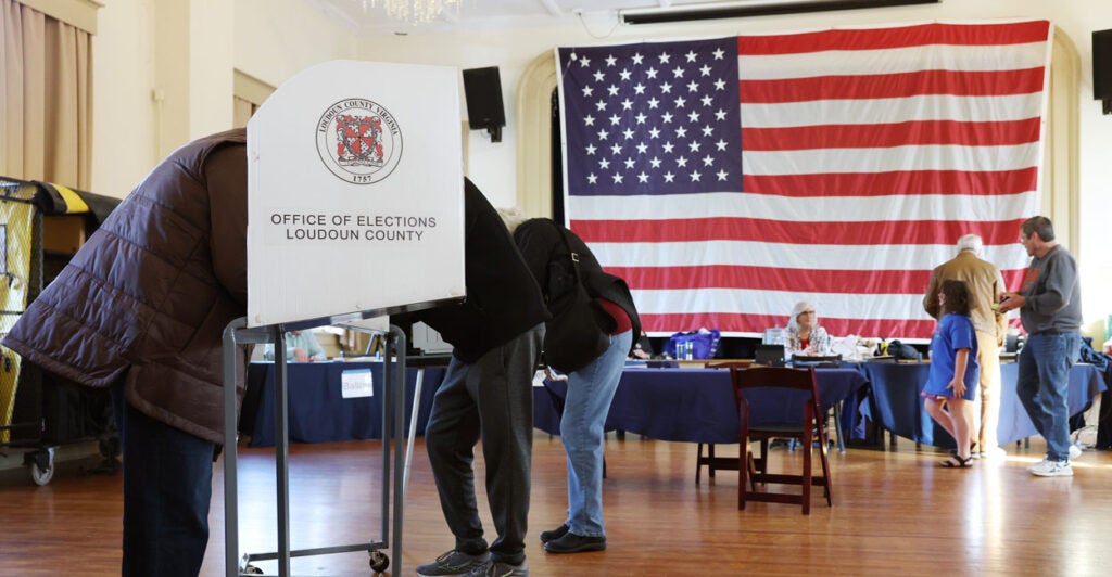 Voters fill out their ballots at a polling station in the Hillsboro Old Stone School on Nov. 04, 2025 in Hillsboro, Virginia.