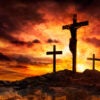 A graphic representation of Jesus on the Cross at Calvary, silhouetted against a cloudy orange sky.