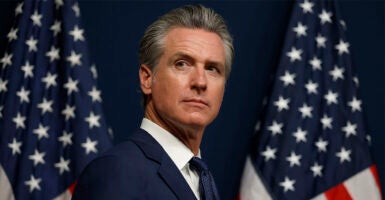 SACRAMENTO, CALIFORNIA - AUGUST 21: California Gov. Gavin Newsom looks on during a bill signing event related to redrawing the state’s congressional maps on August 21, 2025 in Sacramento, California. In a move to counter Texas House Republicans’ plan to redraw the state’s congressional maps ahead of the 2026 midterm elections, California Democrats took up a proposed constitutional amendment to temporarily redraw their own congressional maps, potentially creating five additional U.S. House seats for their party. (Photo by Justin Sullivan/Getty Images)