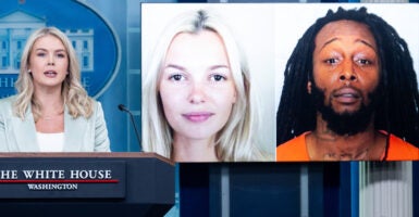 White House Press Secretary Karoline Leavitt speaks alongside a photo of Ukrainian refugee Iryna Zarutska, who was allegedly killed by Decarlos Brown Jr. (R), on a light rail train in Charlotte, North Carolina, during a press briefing in the Brady Press Briefing Room of the White House in Washington, DC, September 9, 2025. (Photo by SAUL LOEB / AFP) (Photo by SAUL LOEB/AFP via Getty Images)